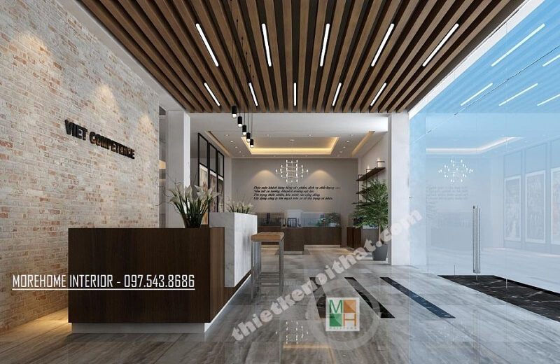 Mẫu thiết kế quầy lễ tân văn phòng công ty VCC đẹp, sang trọng sử dụng kính cường lực cao cấp để tận dụng ánh sáng tự nhiên chiếu vào khiến không gian thêm rộng hơn